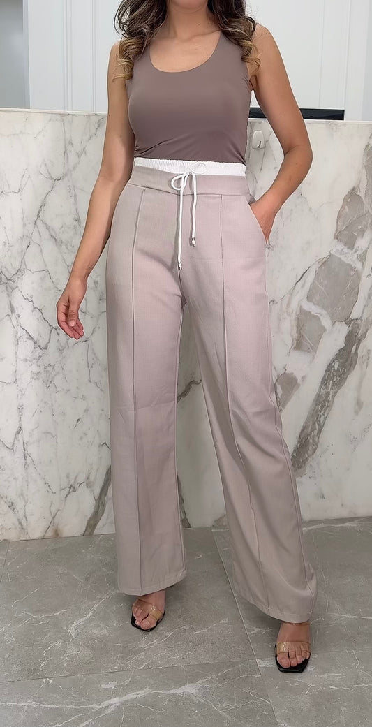 pantalon beige bande blanche