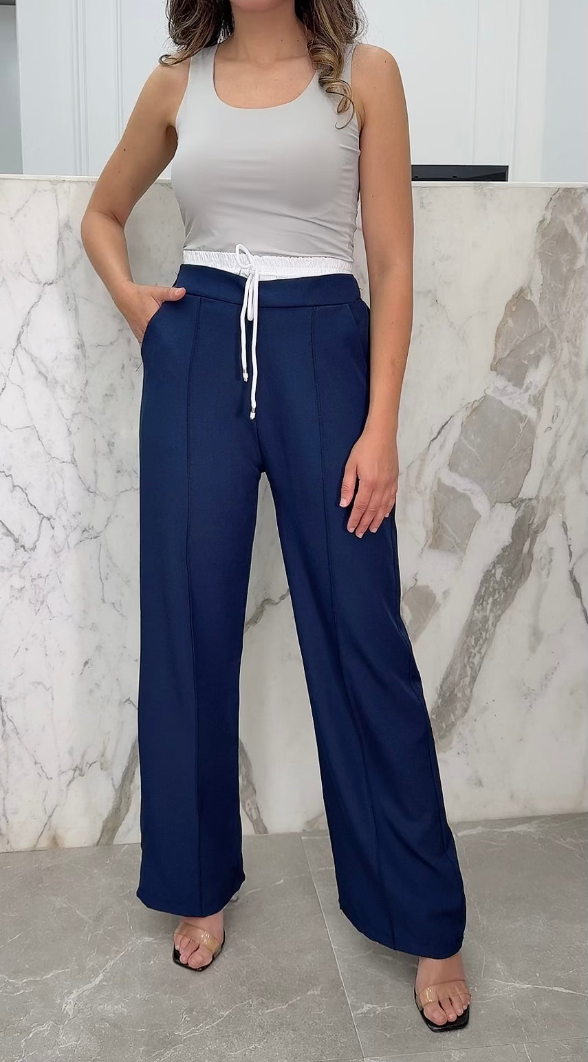 pantalon beige bande blanche