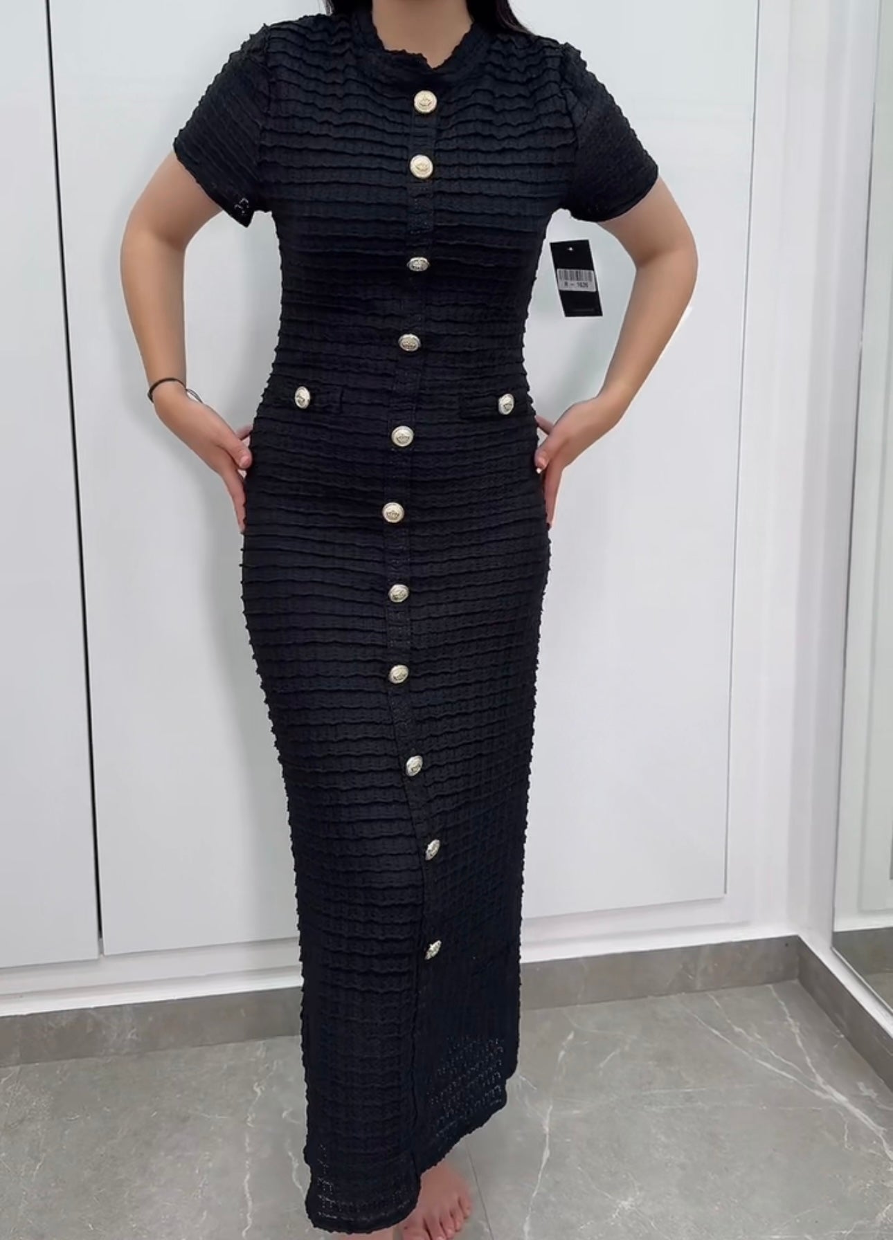 robe longue bouton couronne