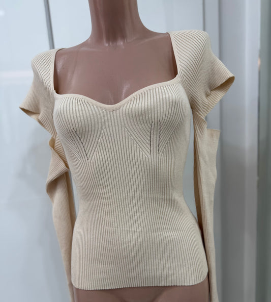 Pull manche coupée